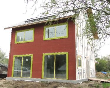 Building the NewenHouse Kit Home: The Heat Recovery Ventilation Unit and Insulation Installation Image